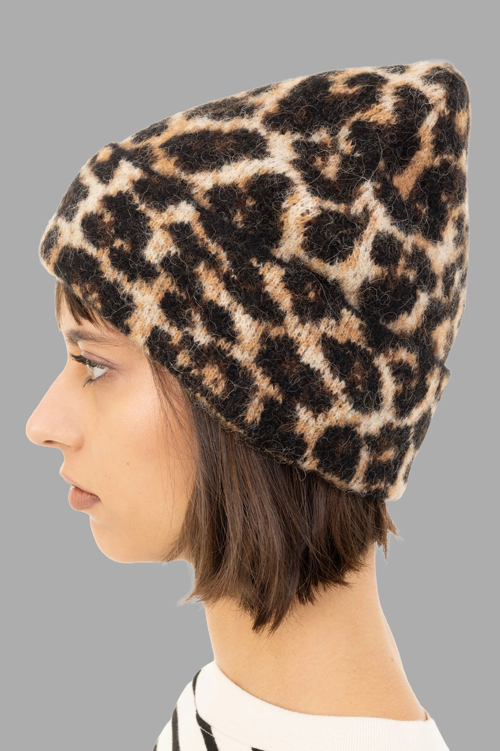 ANINE BING women leopard-print beanie in black and brown, side view, fuzzy knit texture and folded brim