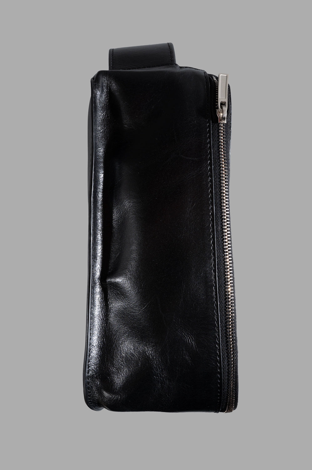 Rick Owens beauty case in black, side view, metal zip track and structured profile