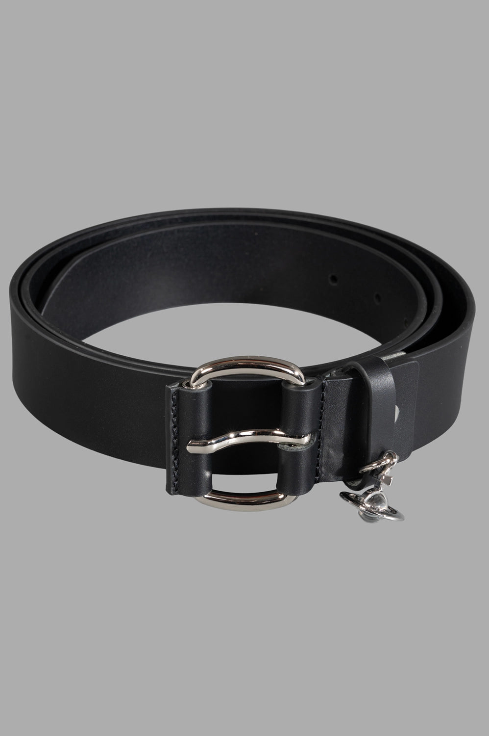 Vivienne Westwood belt in black, three-quarter view, smooth strap with single leather keeper and silver hardware.