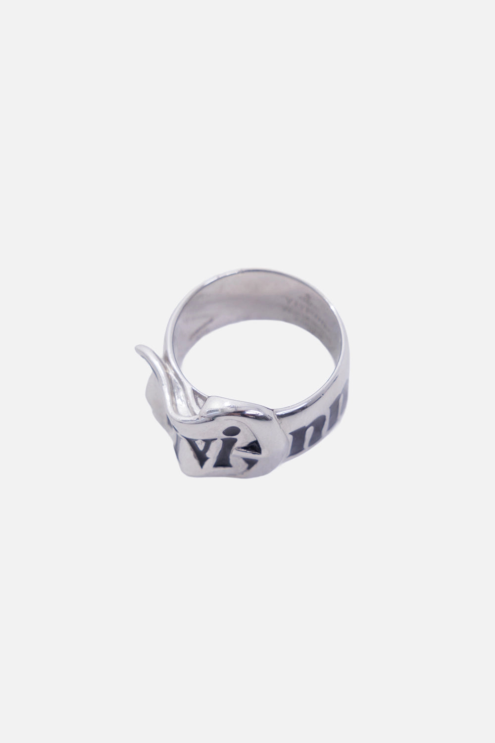 Vivienne Westwood women's Belt ring in platinum, three-quarter view with curved buckle tip and enamel lettering