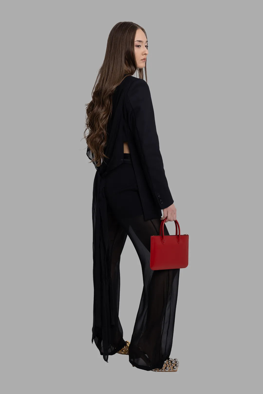 MSGM women's black blazer, on-model full length side-back view with open back and tied sash detail