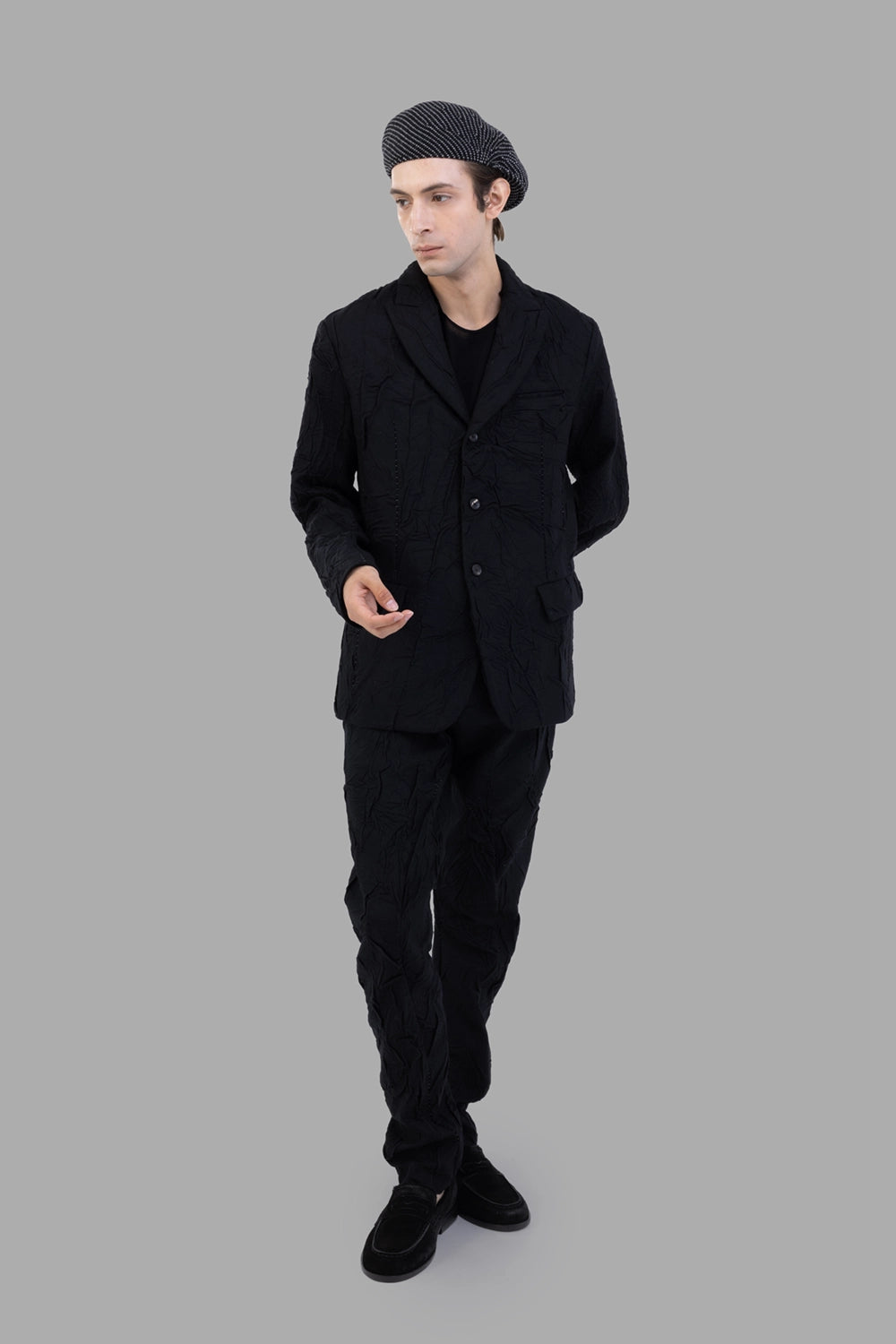 Masnada blazer in black, on-model full length, crumpled texture with three-button front
