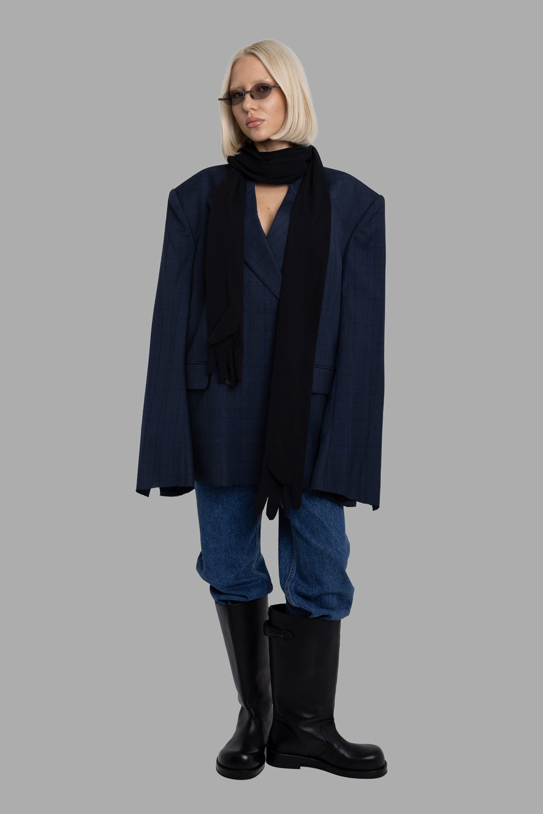 Natasha Zinko women's blue checked windowpane blazer, on-model full length, exaggerated shoulders and long sleeves