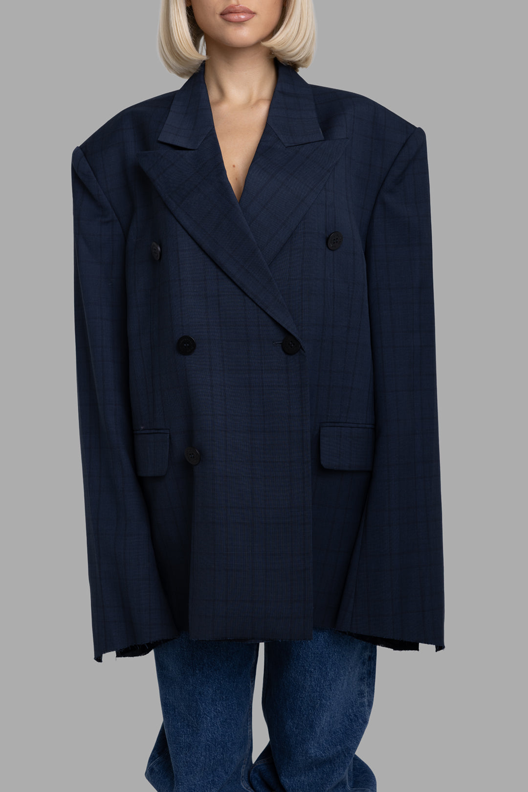 Natasha Zinko women's blue checked windowpane blazer, front half-length view with double-breasted buttons and peak lapels