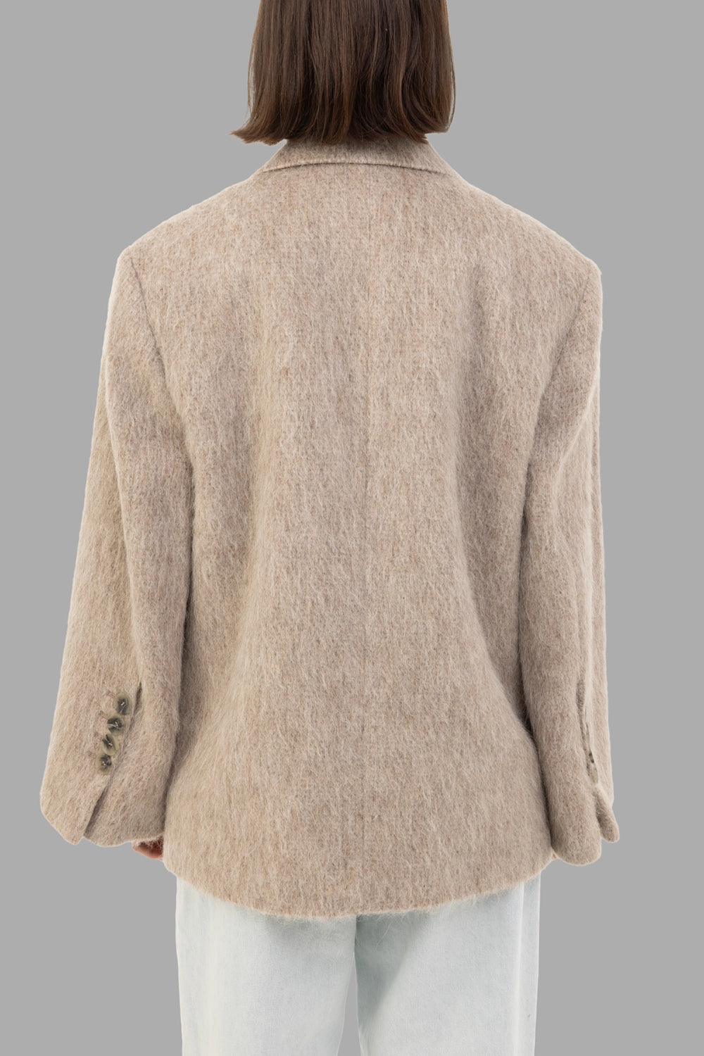 By Malene Birger women blazer in Cobblestone, fabric close-up, fuzzy brushed texture and horn-effect buttons.