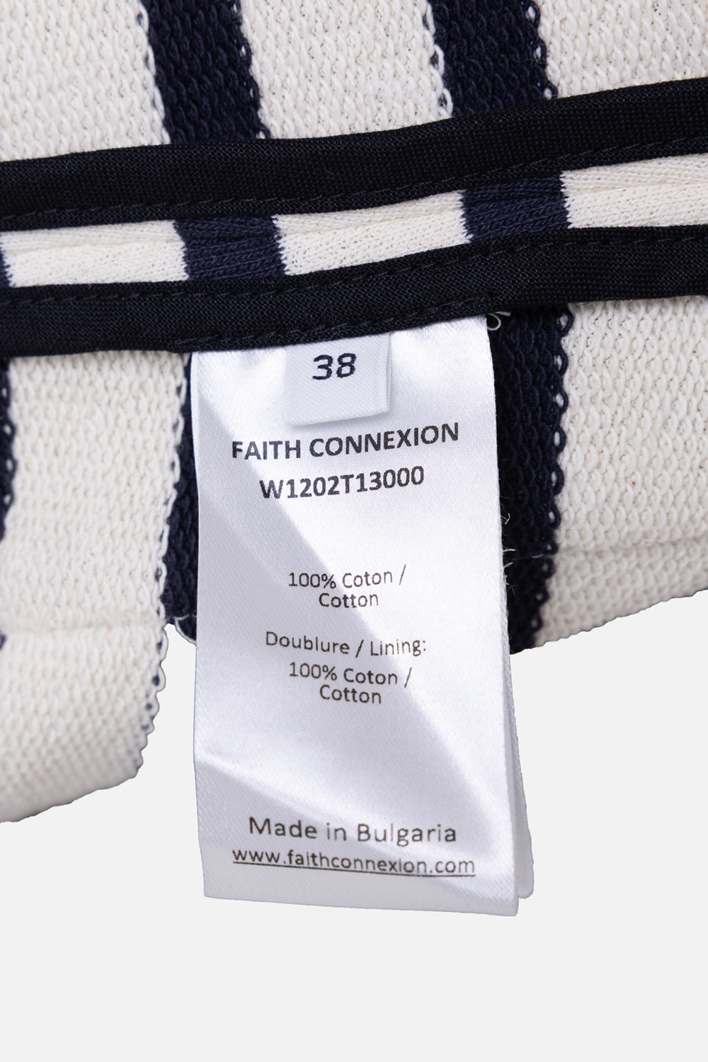 Pre-owned Faith Connexion women's blazer in ivory/navy, care label close-up, 100% cotton noted