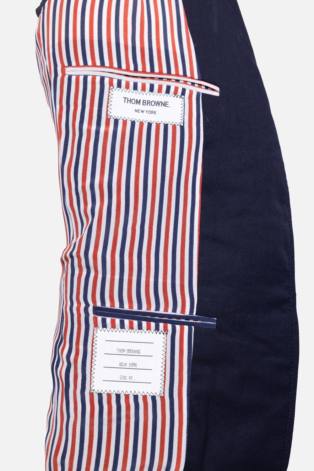 Pre-owned Thom Browne women's blazer in navy, interior view, red-white-blue striped lining and label patch