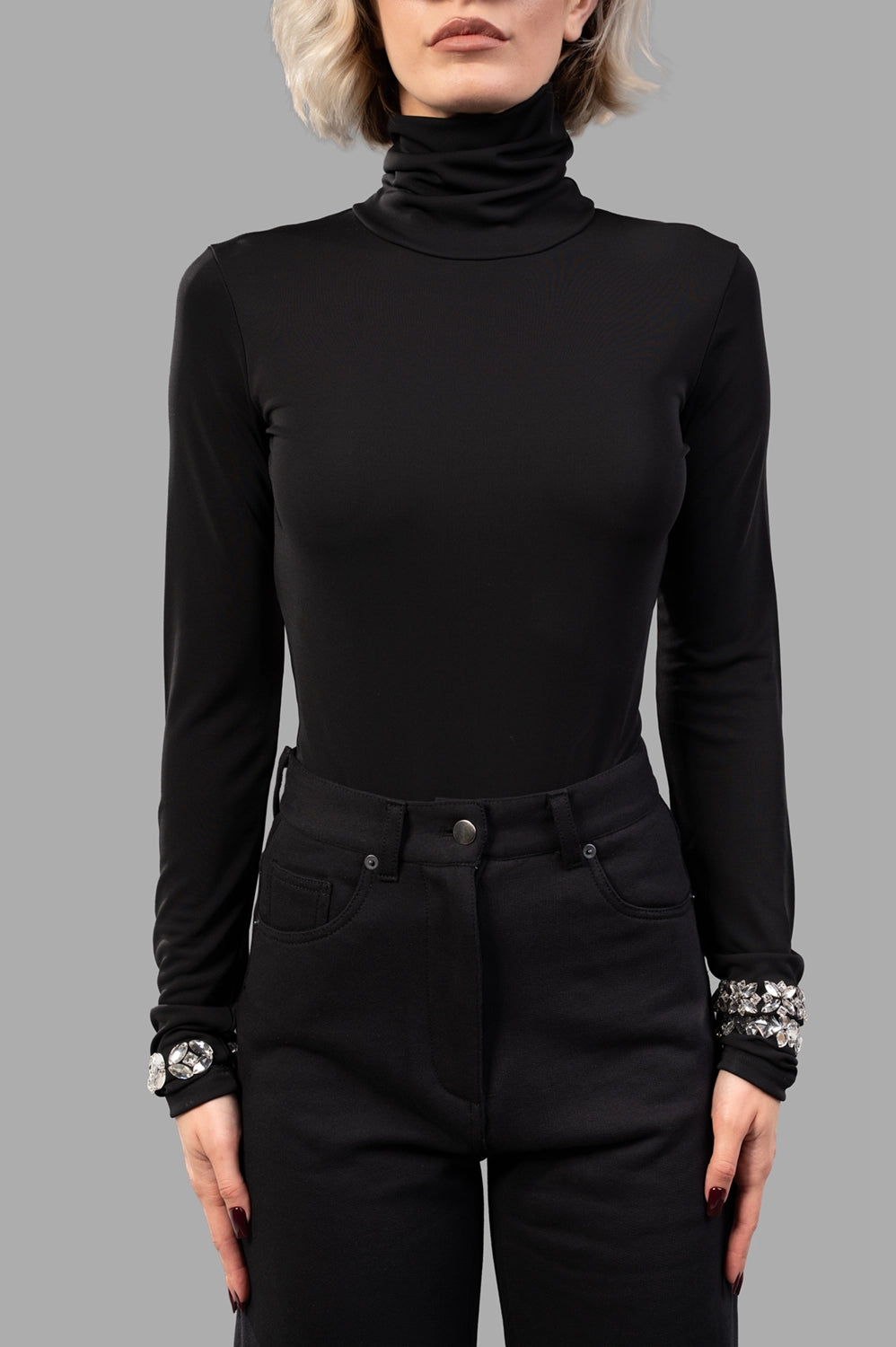 front close-up of black high-neck bodysuit in smooth jersey, slim fit