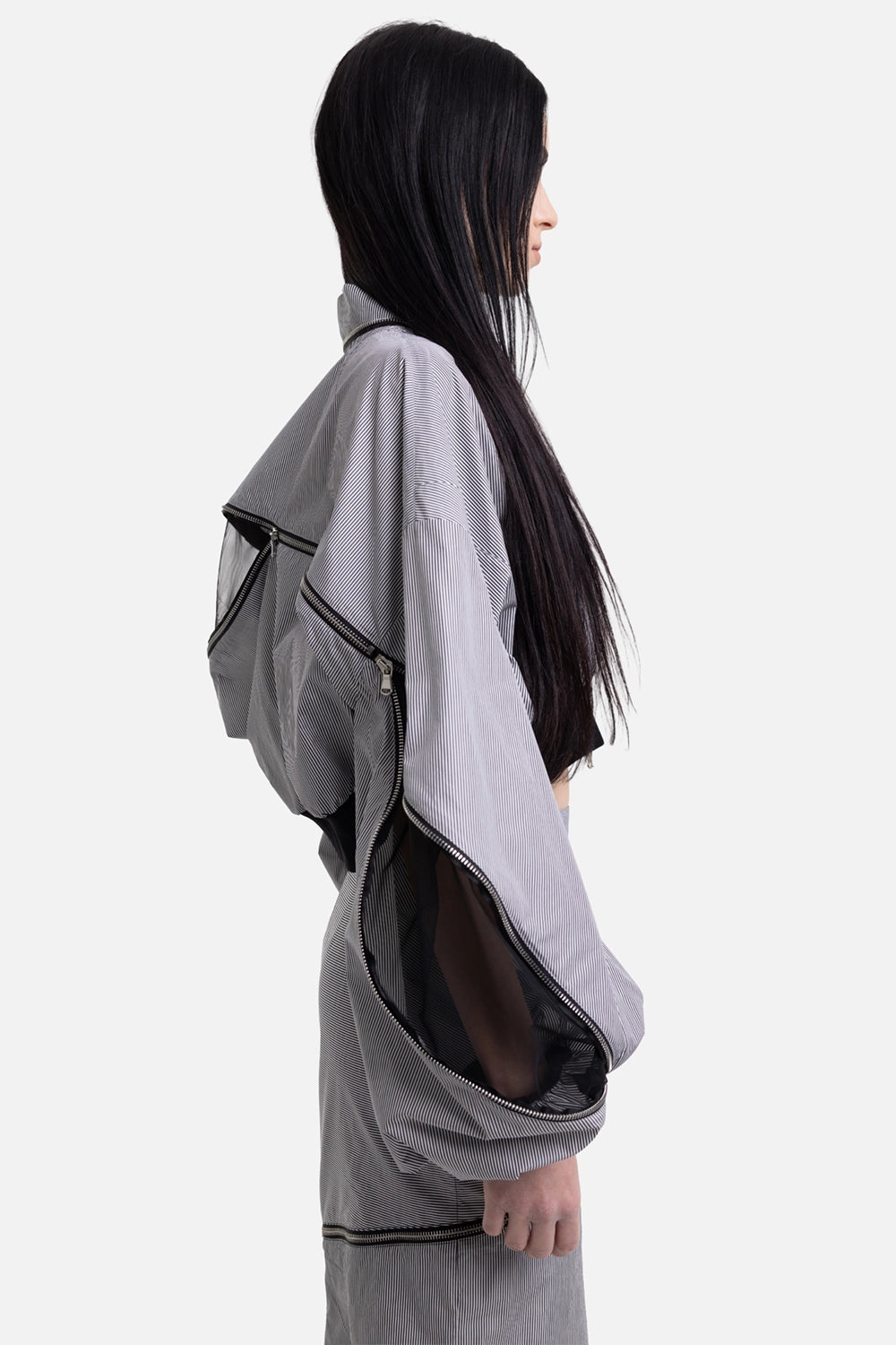 Sehnsucht Atelier women's bomber jacket in black/white, side view, zip-open sleeve and black rib cuff
