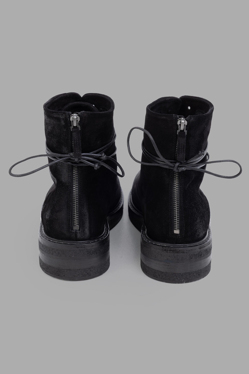 Marsèll boots in black, back view, rear zip closures and tied wrap laces