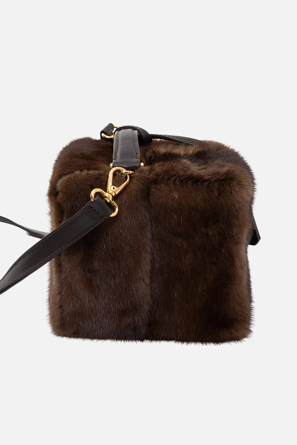 Frenzy women's mink fur box bag in brown, side view, leather shoulder strap with gold swivel clip