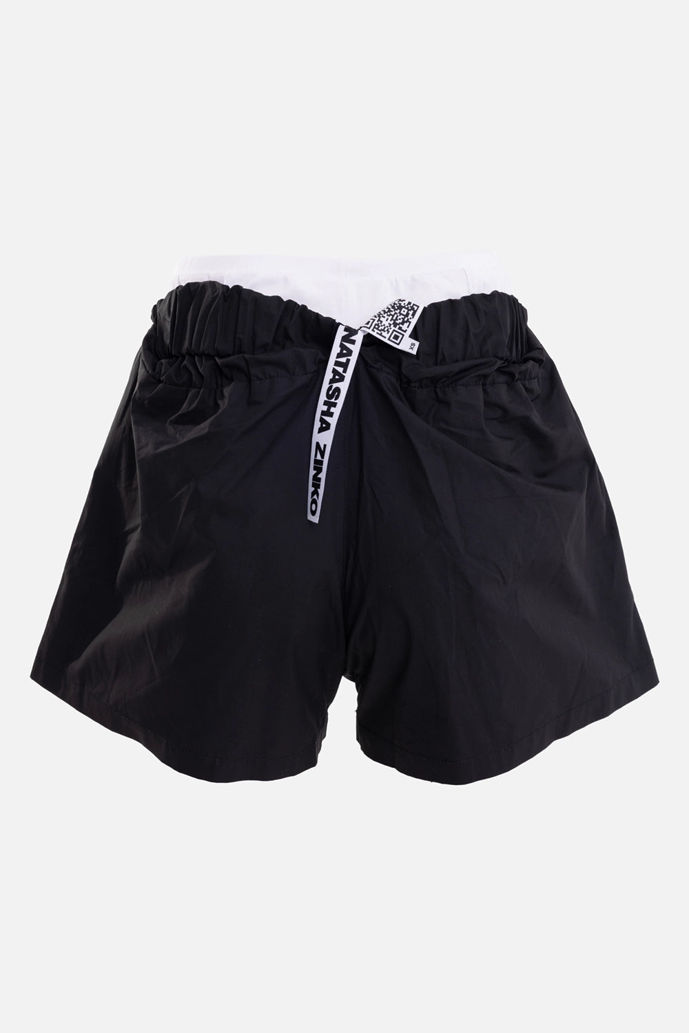 Natasha Zinko unisex boxer shorts in black, back view, logo tape and QR-style label on white waistband