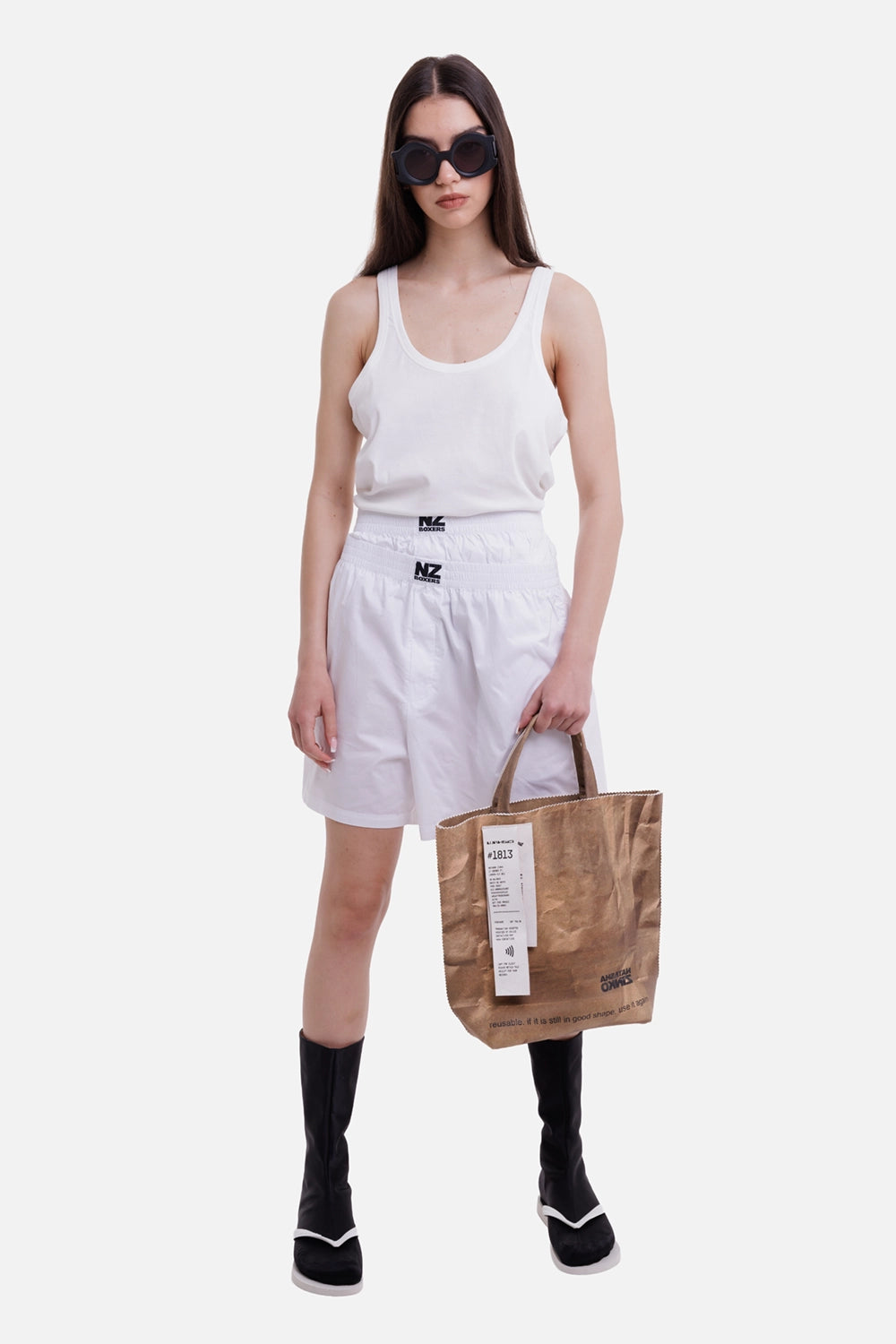 Natasha Zinko women's white boxer shorts, full-length model view with stacked logo waistbands
