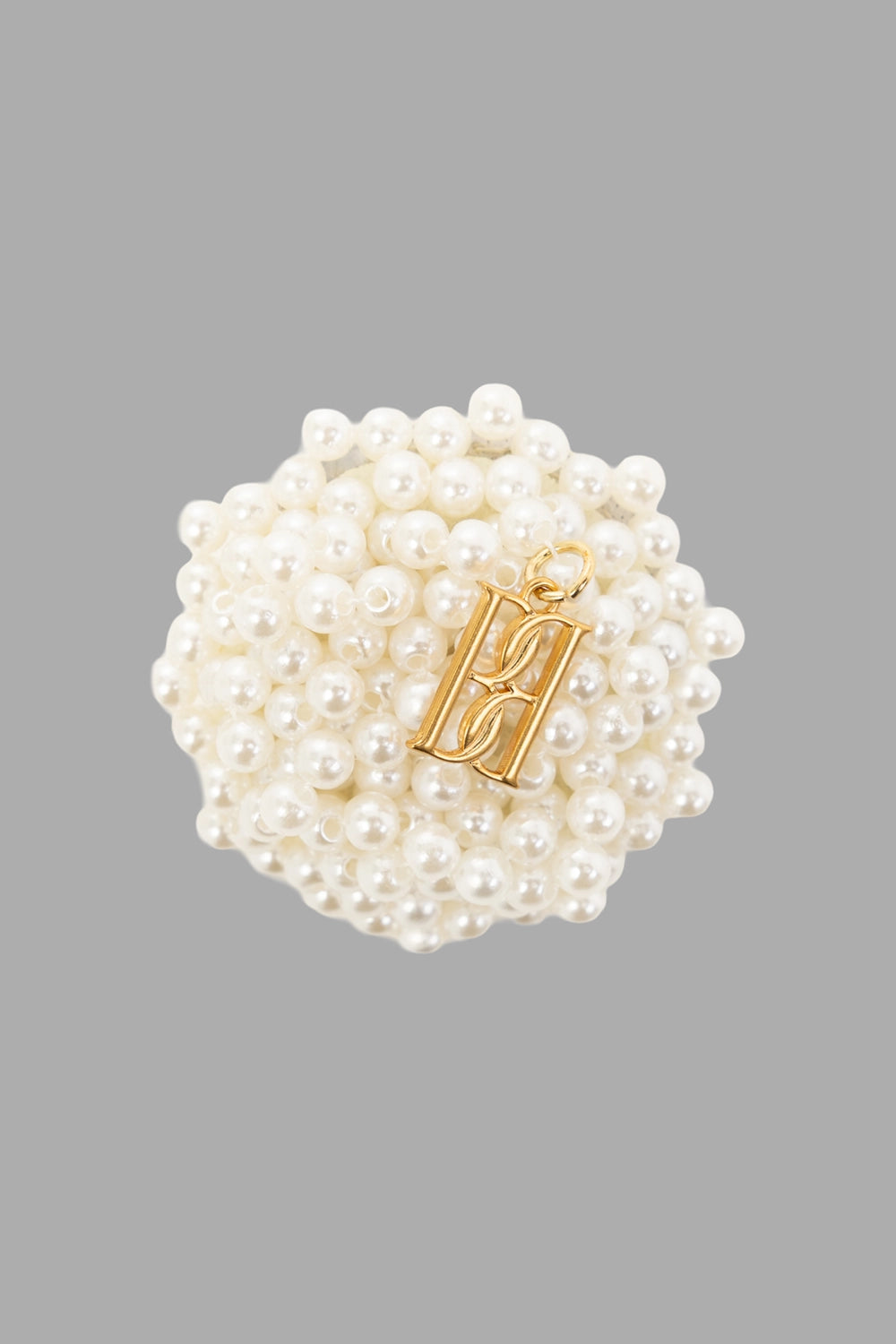 By Malene Birger women's brooch in Soft White, back view, gold-tone tube hinge and leather-look backing