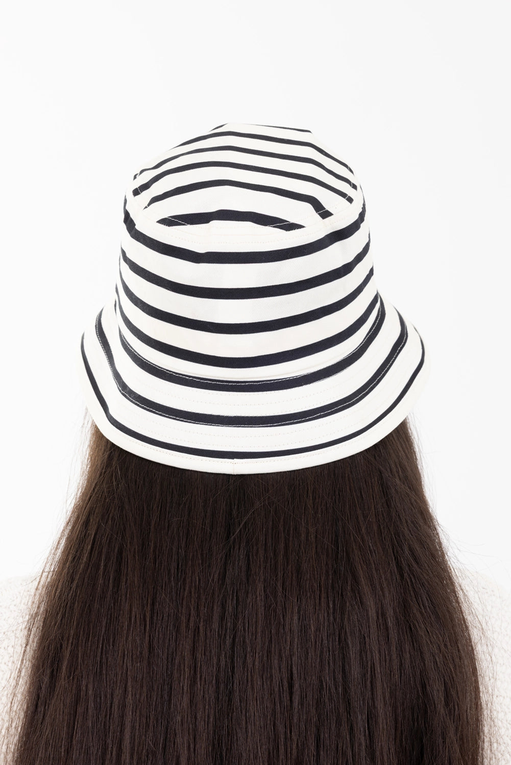 Anine Bing women's bucket hat in black stripe, back view, wide stitched brim with horizontal stripes