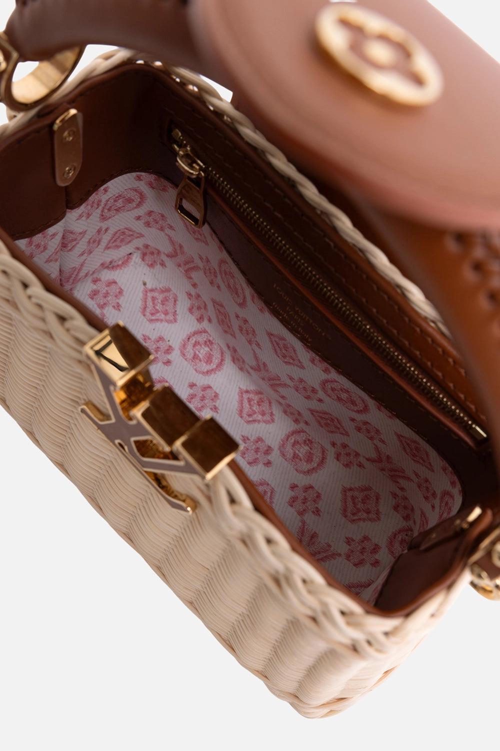 Pre-owned Louis Vuitton Capucines Mini bag in natural rattan, interior view, pink Monogram Flowers lining and zip pocket