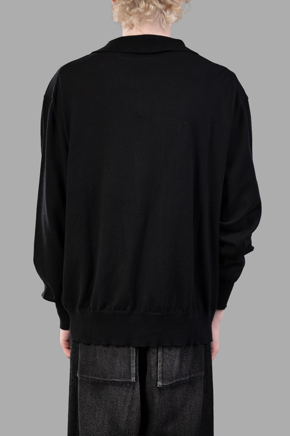 Vivienne Westwood cardigan in black, back view, ribbed hem and relaxed drop shoulders