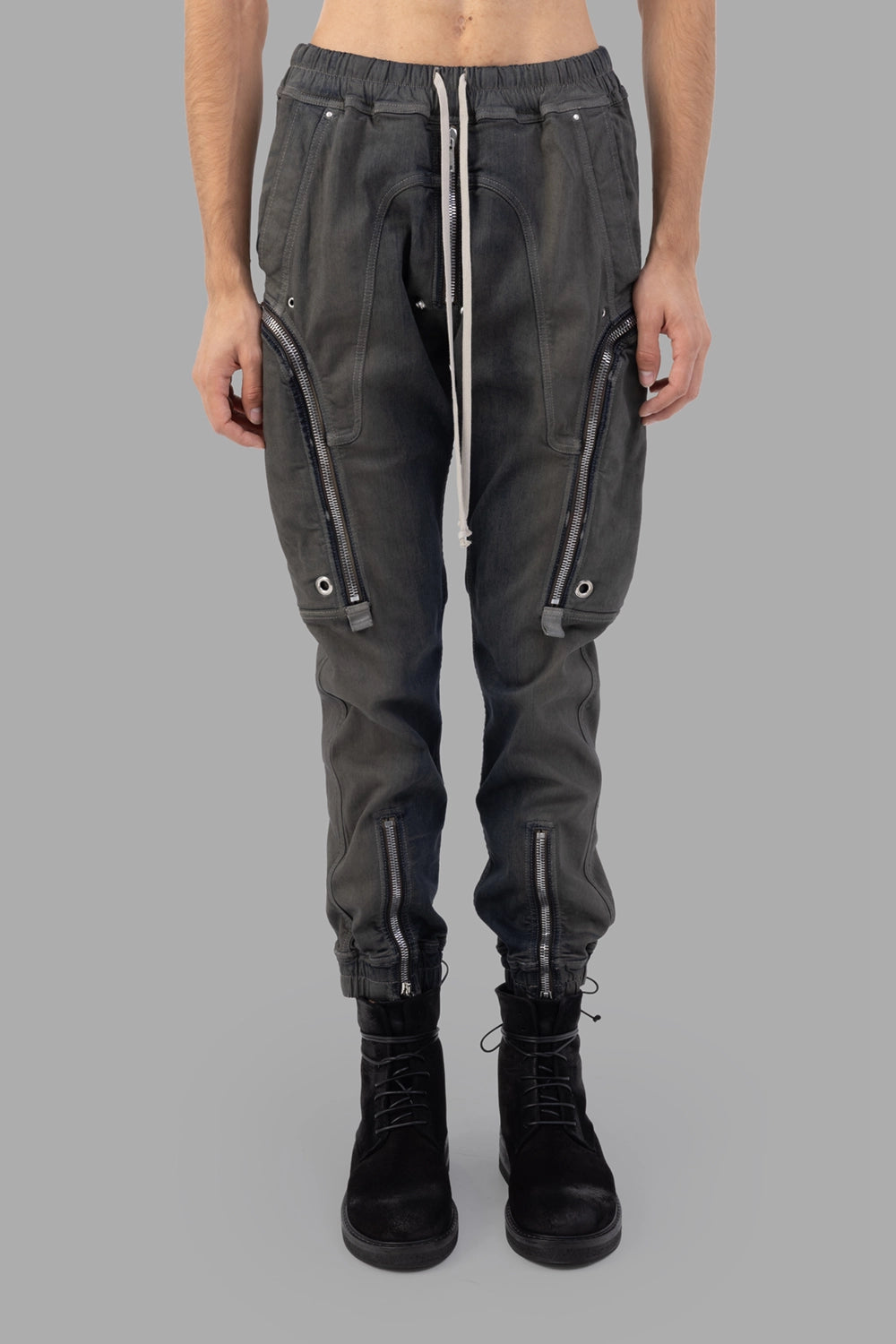 Rick Owens cargo pants in Darkdust Degrade, front view, long drawstrings and curved zip pockets