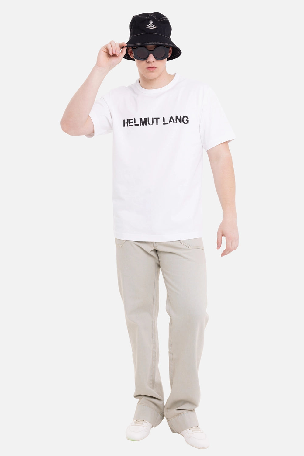 Vivienne Westwood men's carpenter jeans in light blue, on-model full-length view, relaxed straight leg and turned-up cuffs