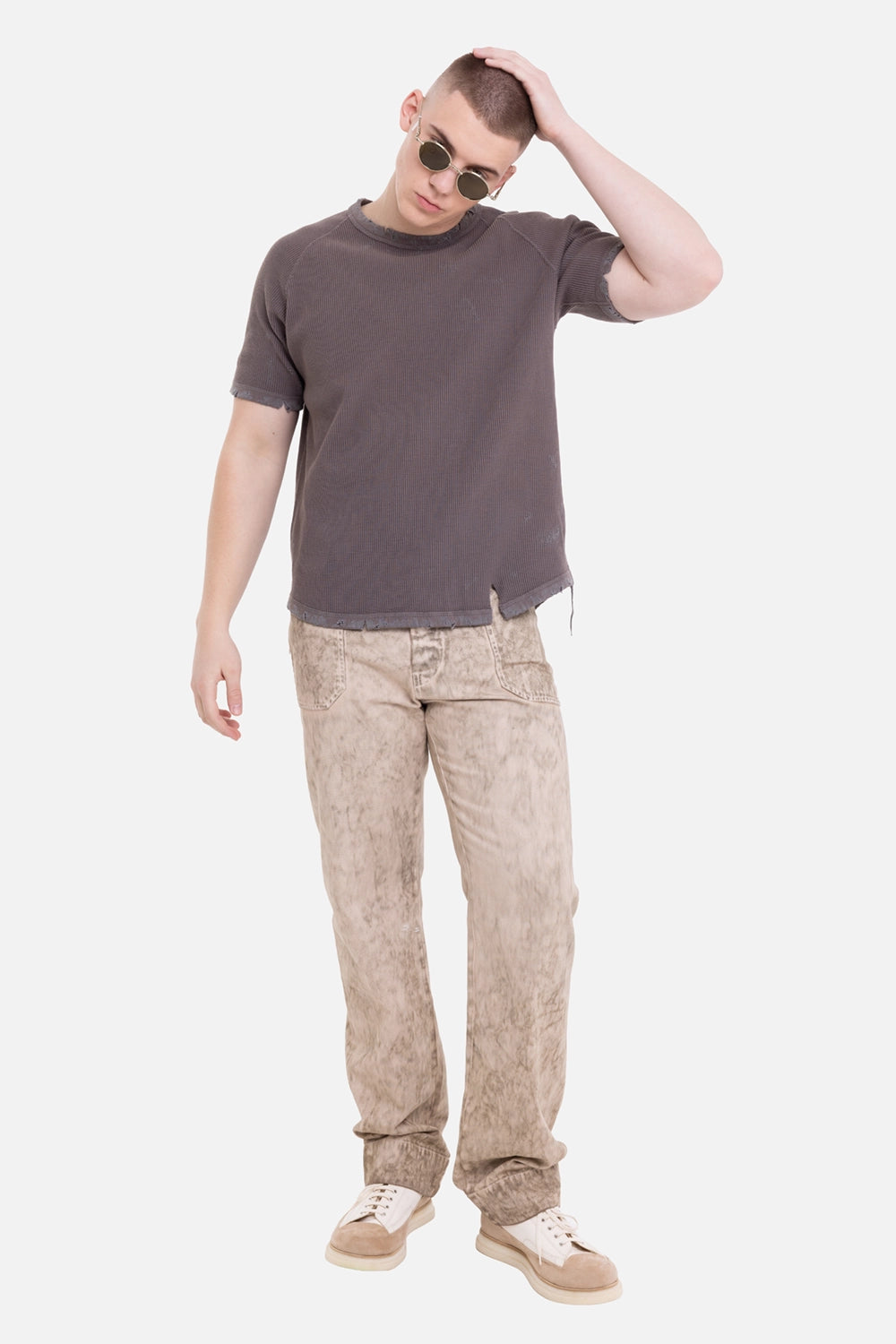 Vivienne Westwood men's carpenter jeans in washed beige, on-model full-length view, wide straight leg