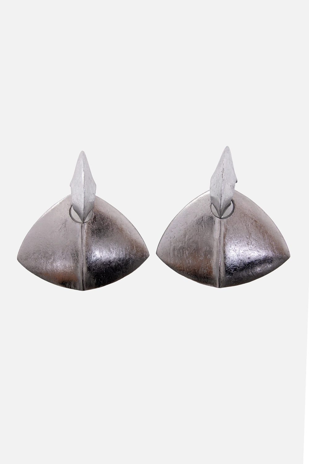 Monies clip-on earrings in silver, front view with faceted acacia forms and raised foil peaks