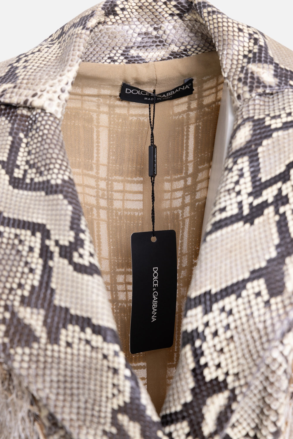 Pre-owned Dolce & Gabbana women’s coat in beige/multi, interior view, brand label and attached hang tag