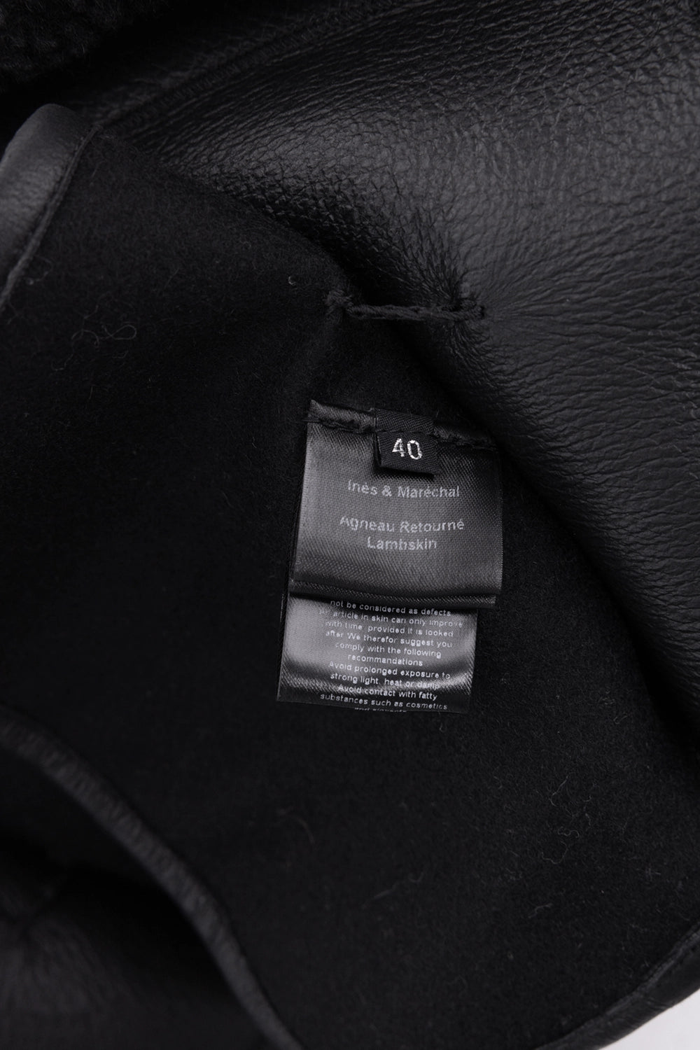 Pre-owned Inès & Maréchal coat in black, label view, interior brand label and size 40 tag
