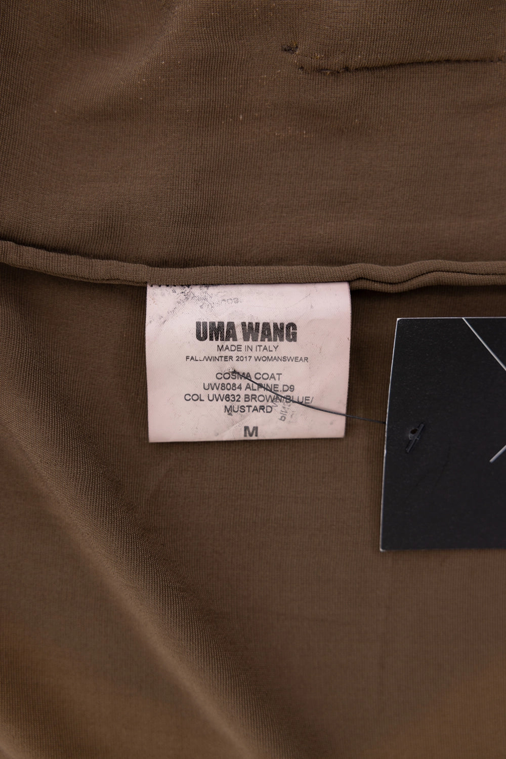 Pre-owned Uma Wang coat in brown/blue/mustard, interior label close-up, Cosma Coat tag