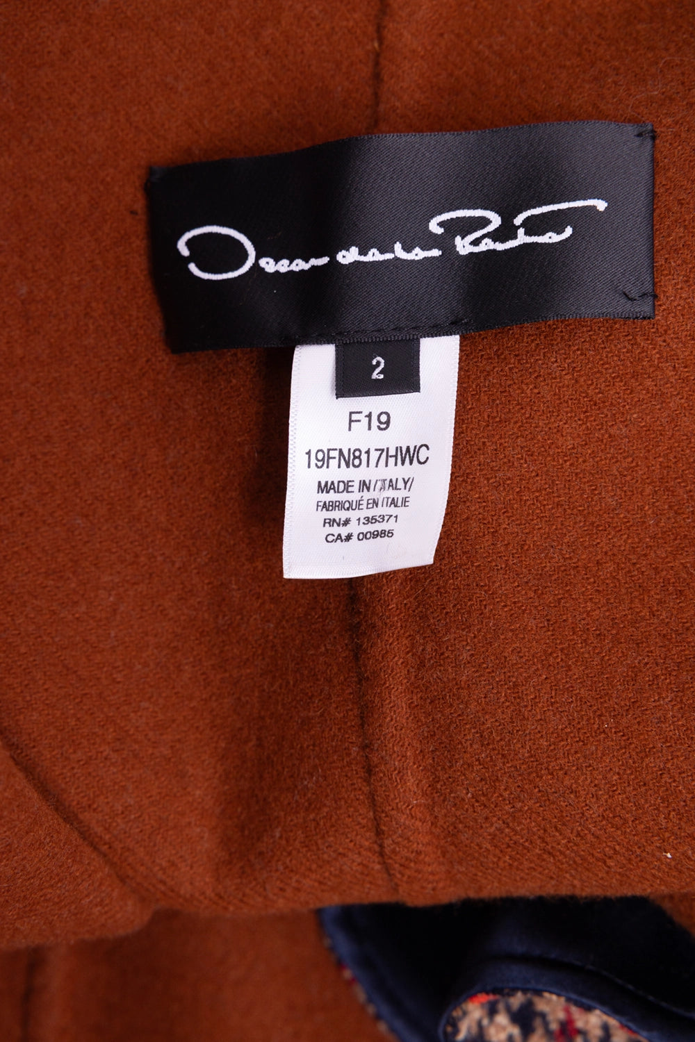 Pre-owned Oscar de la Renta coat in multicolor, label detail view, size 2 and season tag under brand label