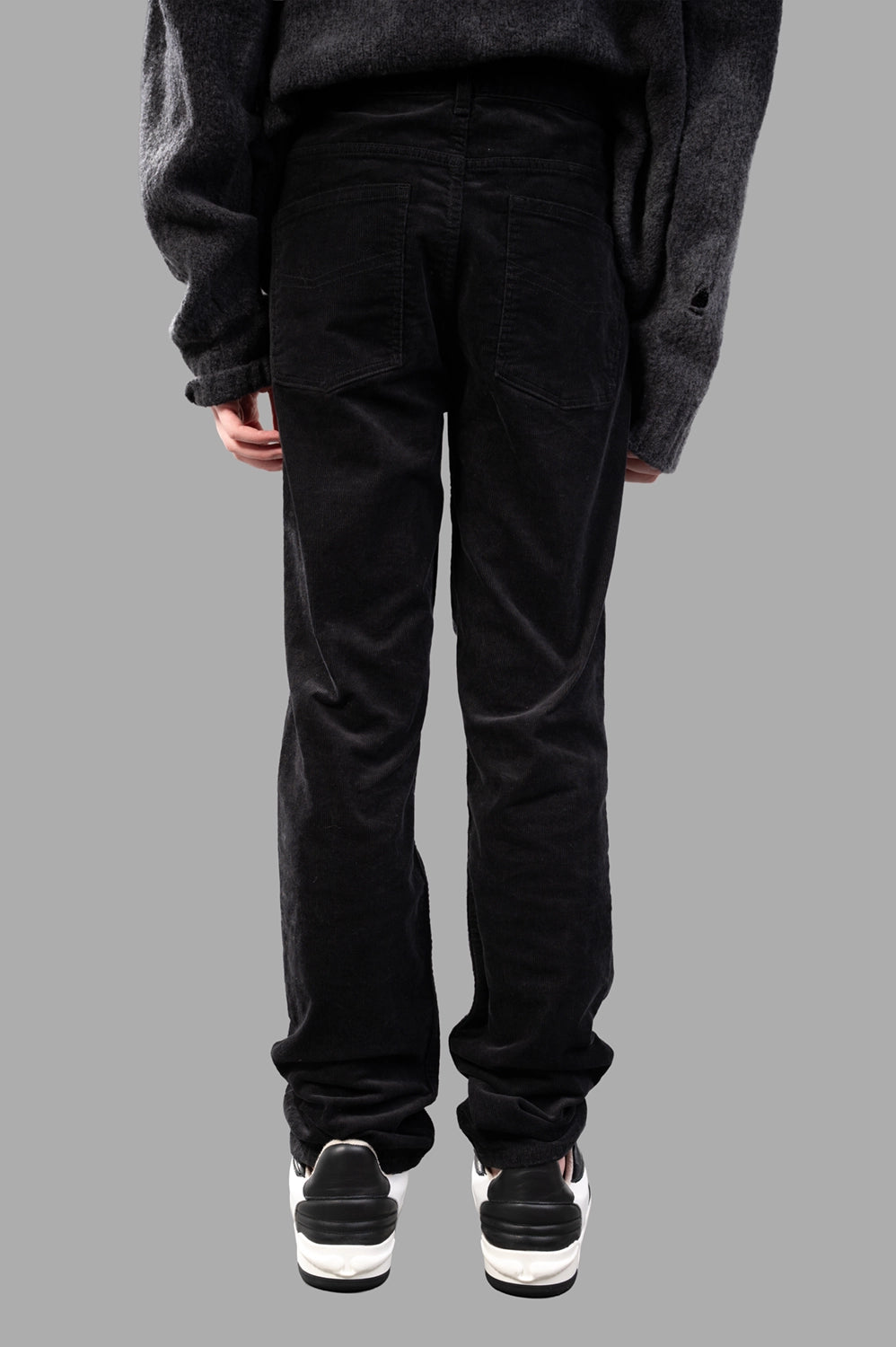 Zadig & Voltaire corduroy pants in Black, back view, two patch pockets and corduroy ridges