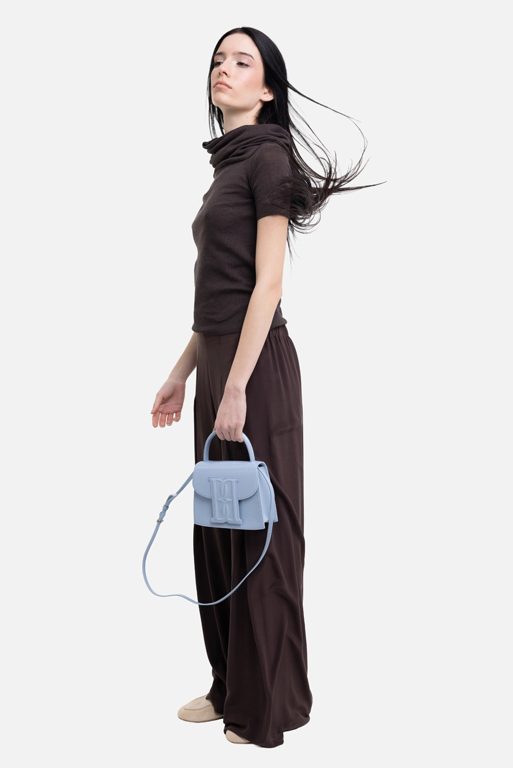 Gentry Portofino women's cowl-neck sweater in moro, on-model side view, fitted body and draped neck