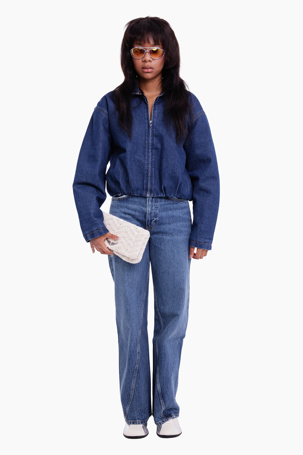 MSGM women's denim bomber jacket in dark blue, full-length model view with cropped elasticated hem