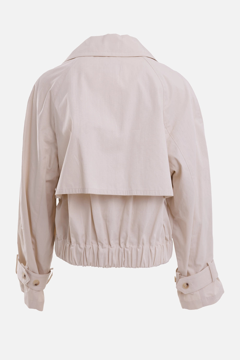Joseph women's cropped trench jacket in Sandstone, back view with storm flap, raglan seams and elasticated hem