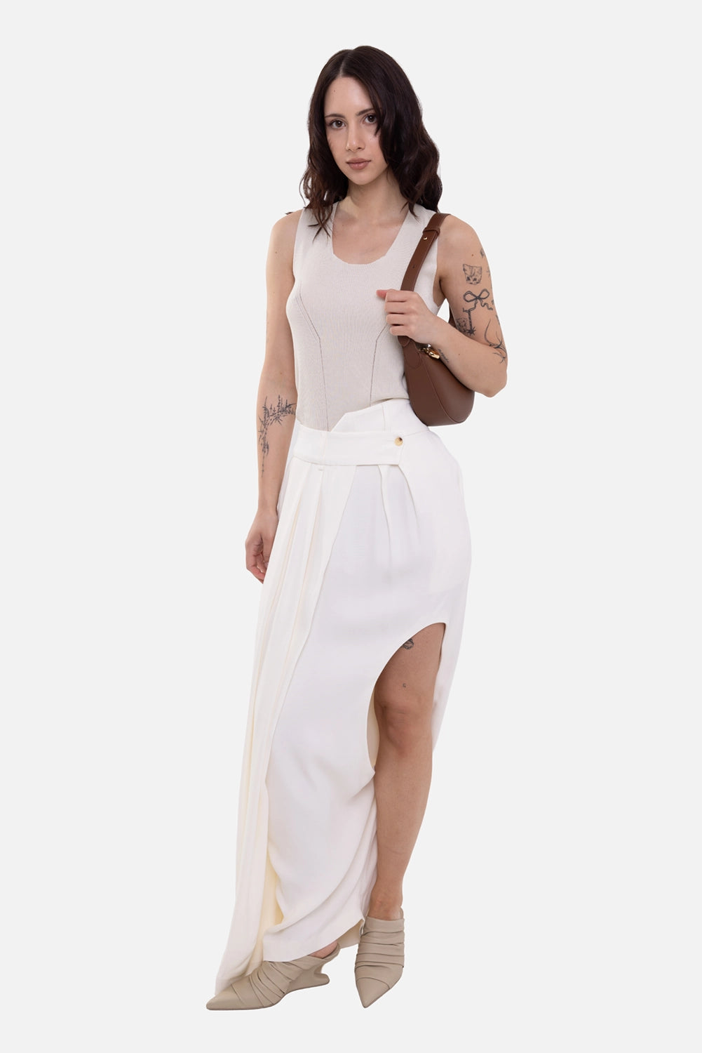 Plus Zero women's cut-out wrap trousers in ivory, on-model full-length view, high slit and pleated front
