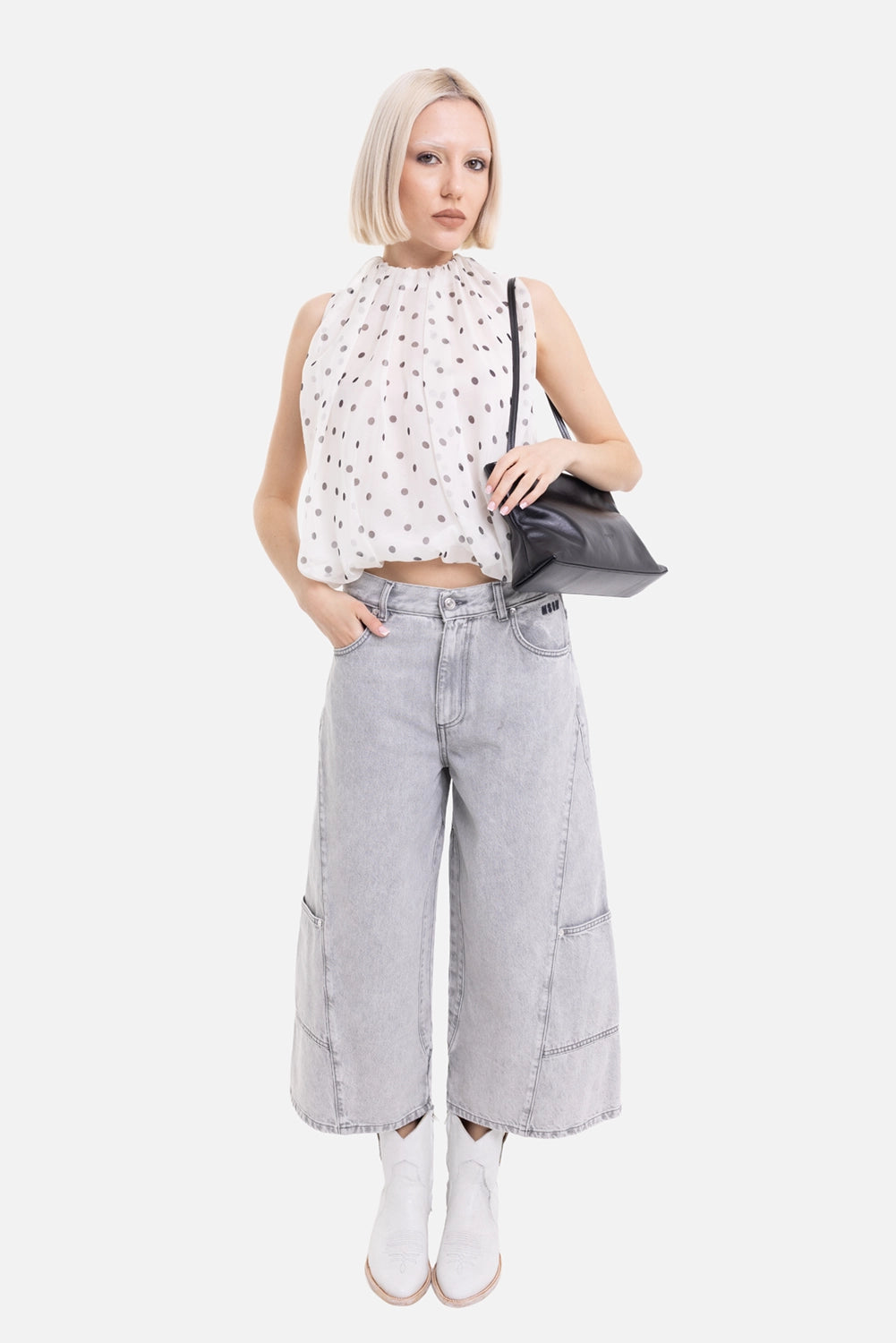 MSGM women's denim Bermuda shorts in Light Grey, on-model full-length view, wide cropped legs and five pockets