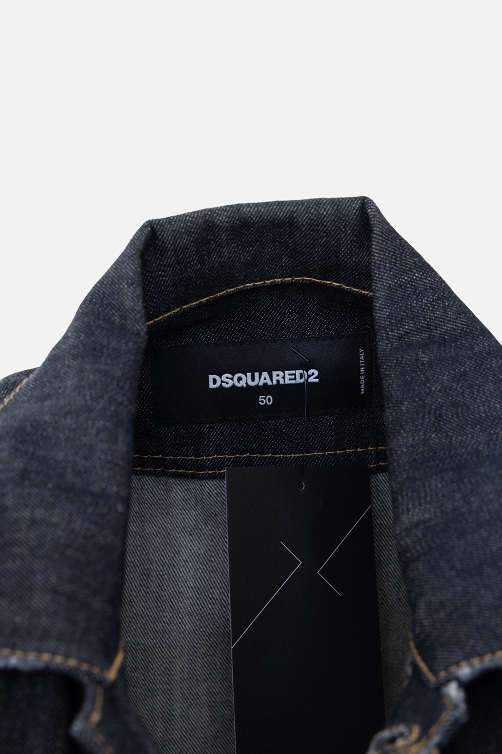 Pre-owned Dsquared2 men's denim jacket in indigo, inner product tag close-up, printed label