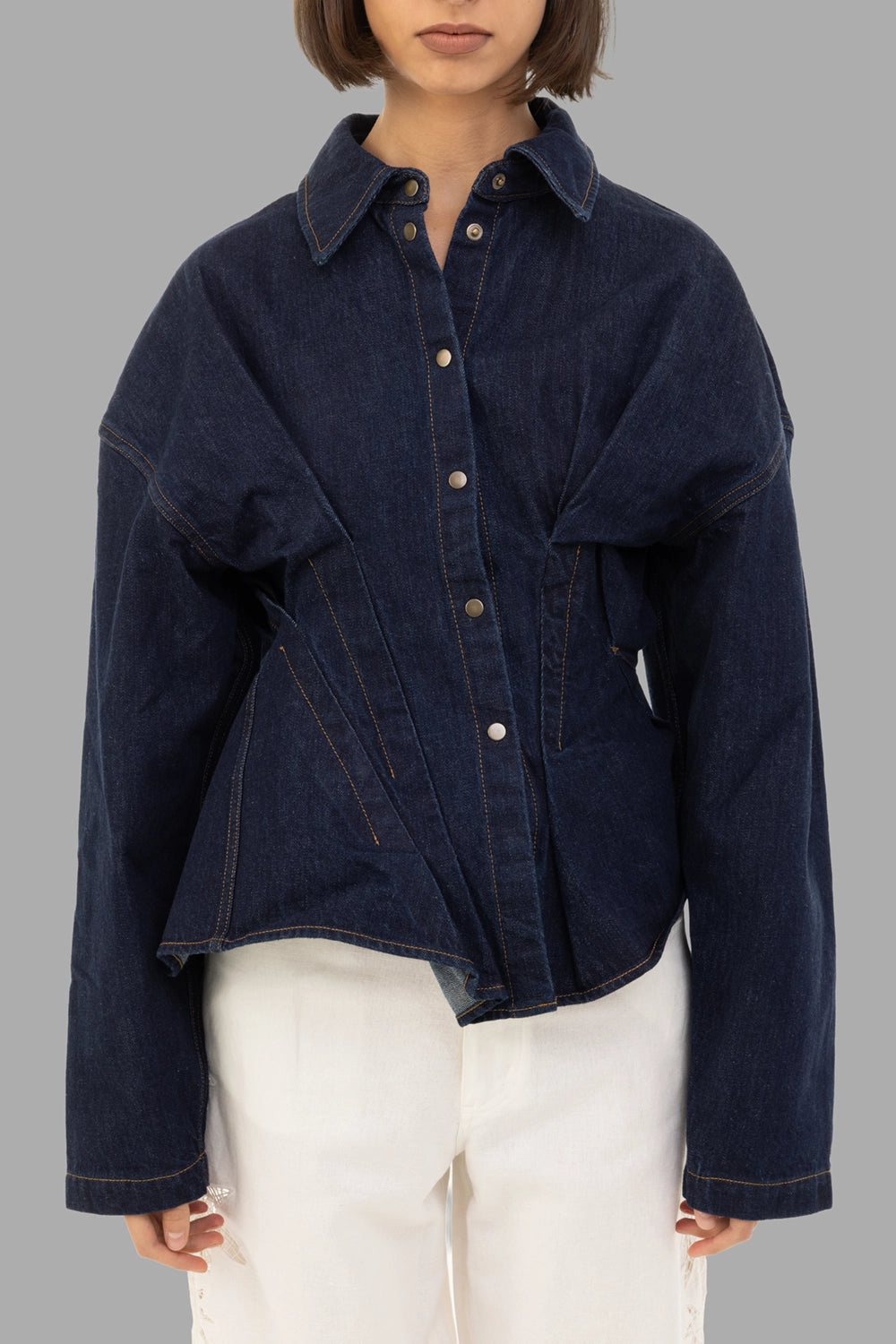 A.W.A.K.E. MODE women's denim shirt in indigo rinse wash, front view, snap front and paneled seams