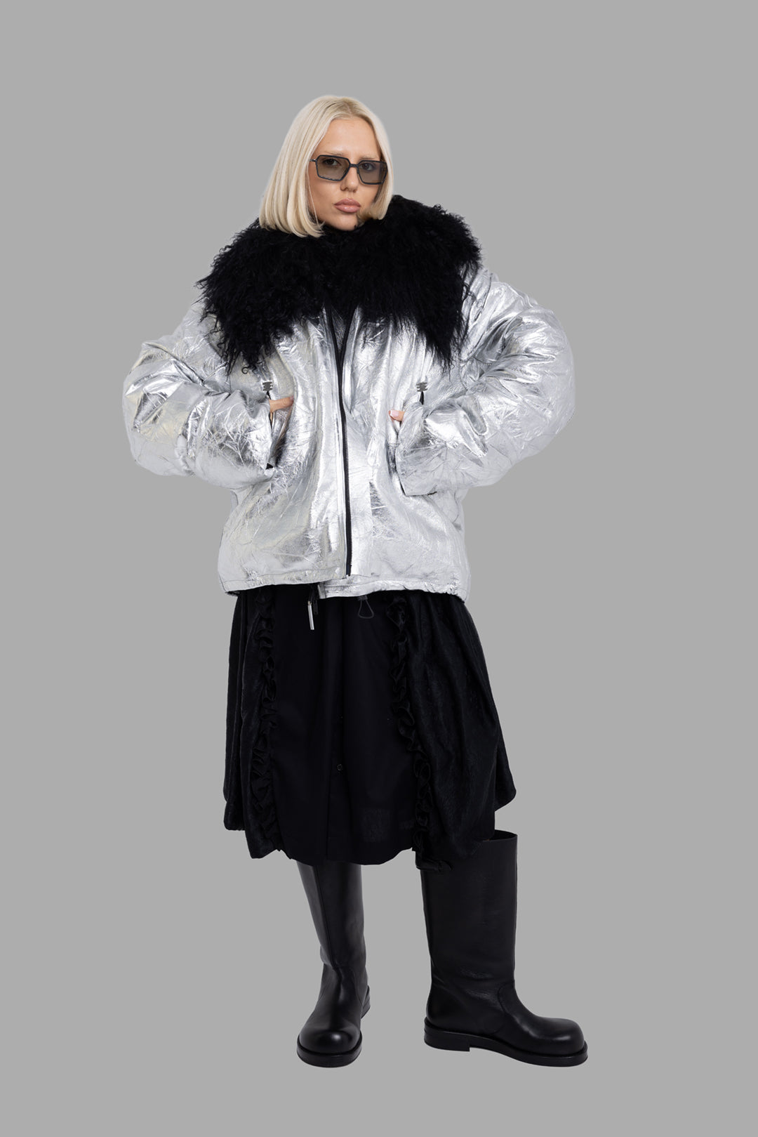 Isaac Sellam unisex metallic silver down jacket with black Mongolian collar, on-model full length.
