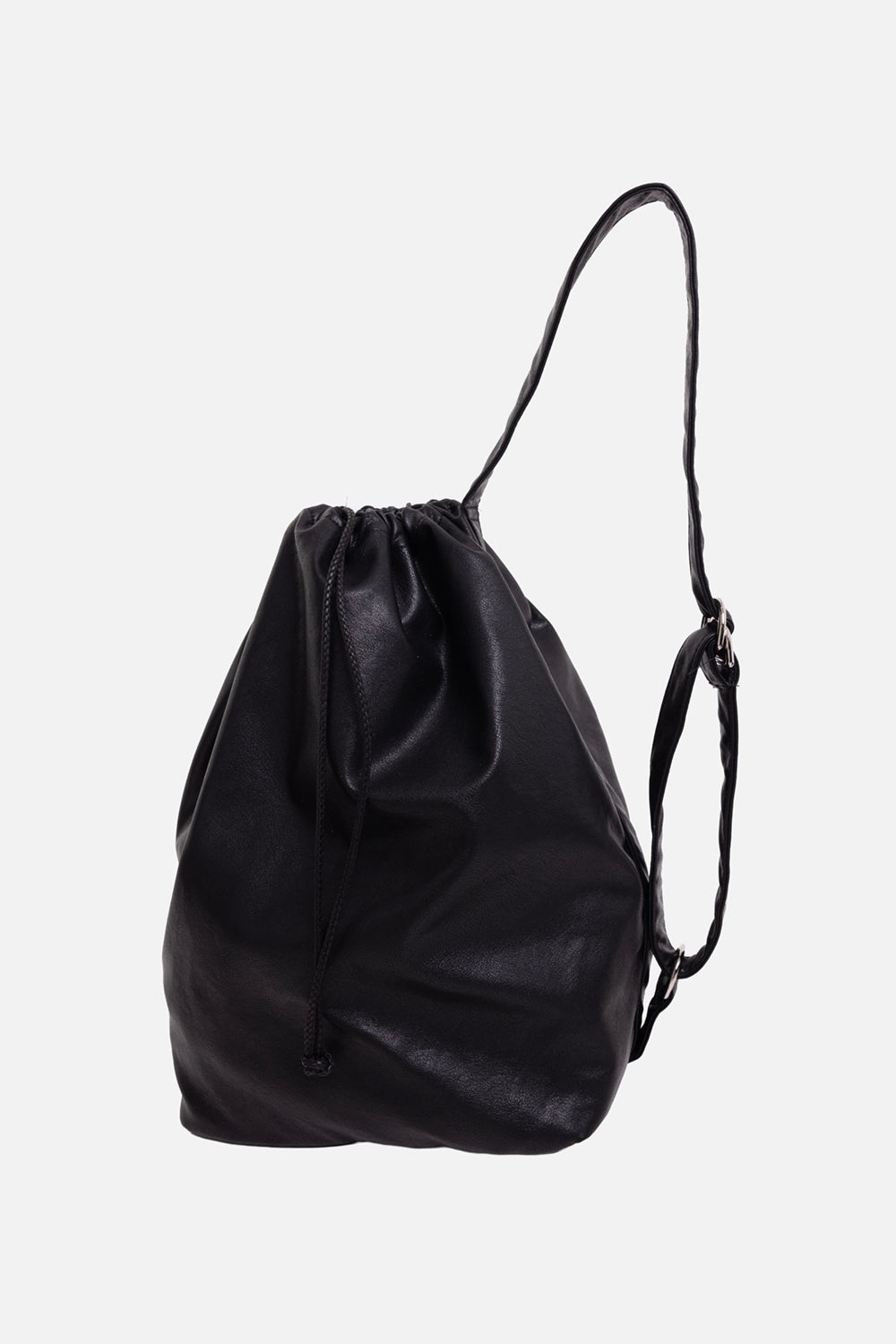 ATTACHMENT bucket bag in black, side view, adjustable shoulder strap and slouchy silhouette