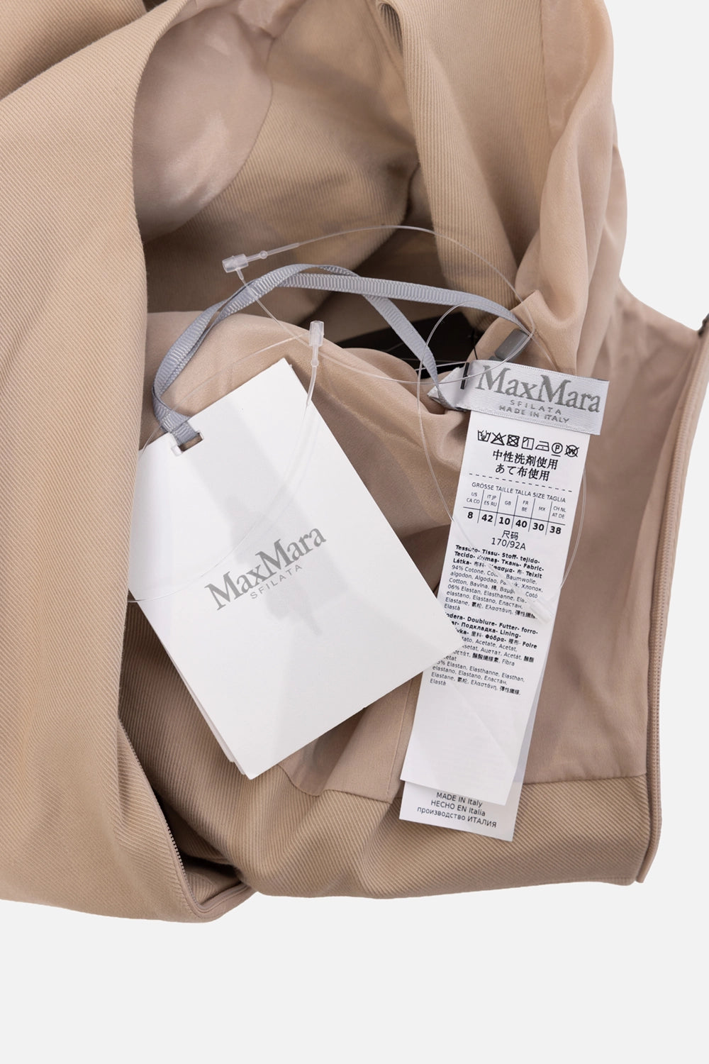 Pre-owned Max Mara dress in beige, label close-up, hang tag and care label