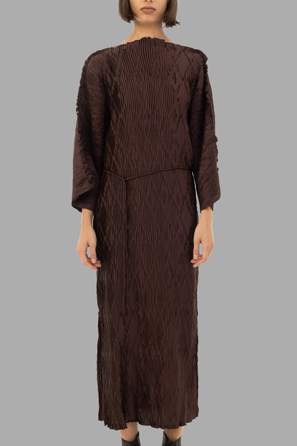 By Malene Birger women pleated maxi dress in Coffee Brown, front view, wide sleeves and rippled plissé texture.