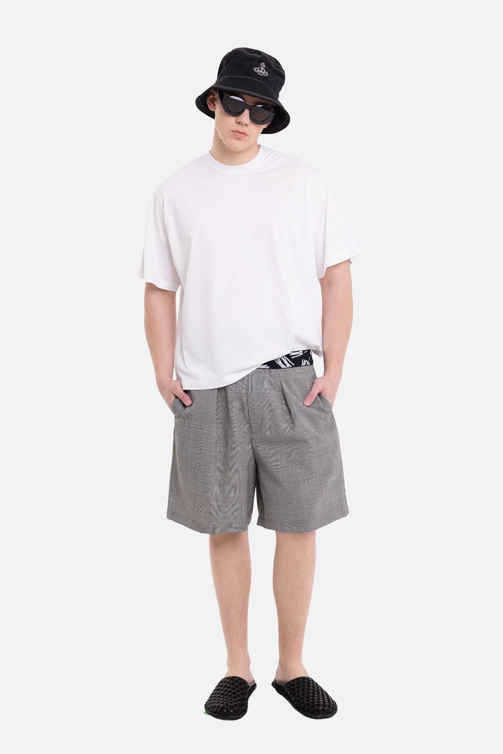 VEIN men's grey glencheck shorts, on-model full-length view, relaxed knee-length fit and logo waistband