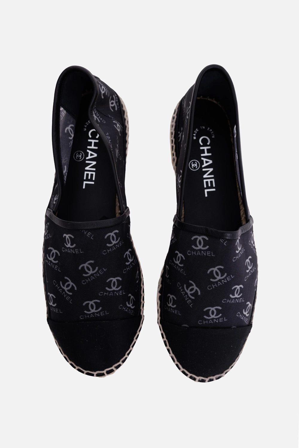 Chanel women's espadrilles in black, top view, branded insoles and monogram vamp panels