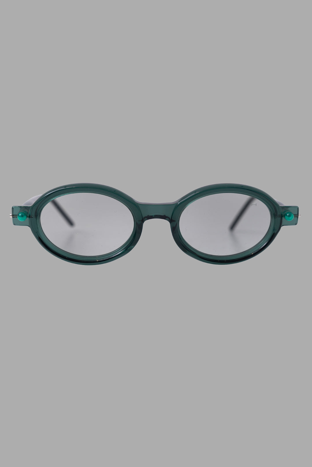 Kuboraum unisex eyeglasses in translucent musk green, front view, rounded oval acetate frame with sculpted bridge.