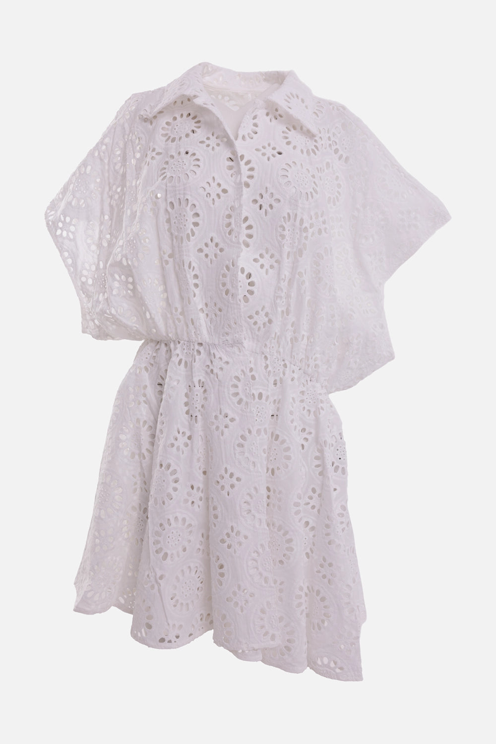 Norma Kamali women's white eyelet mini dress, three-quarter front view with circle cutwork and elastic waist