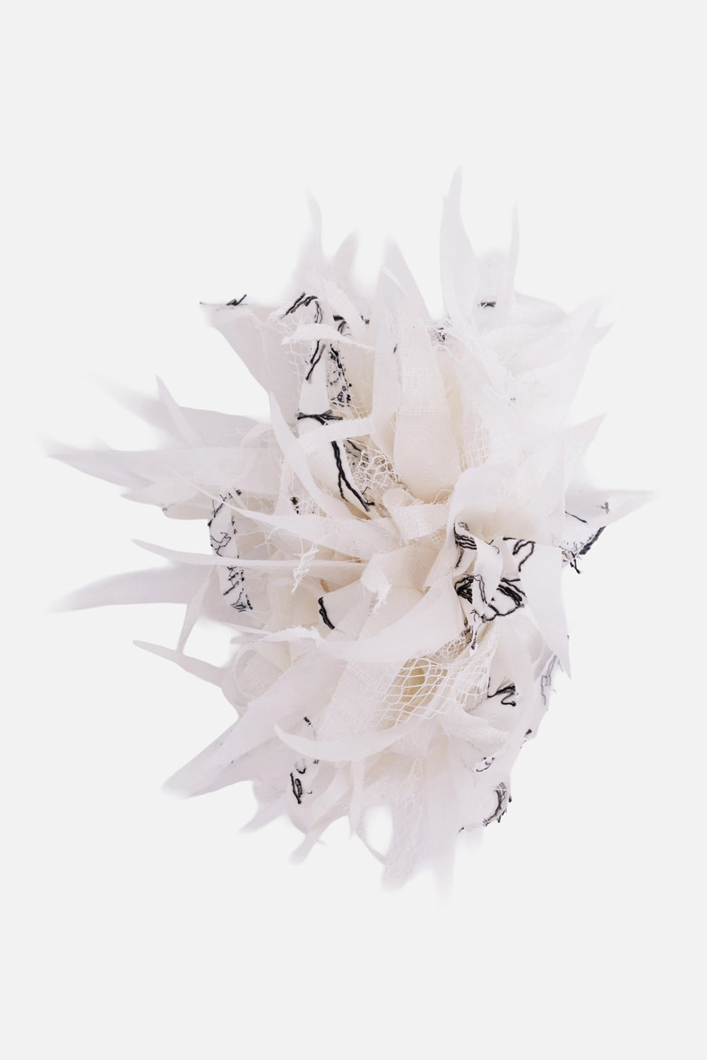 Marc Point Venezia flower brooch in white, front view with pointed fabric strips, mesh and black embroidery