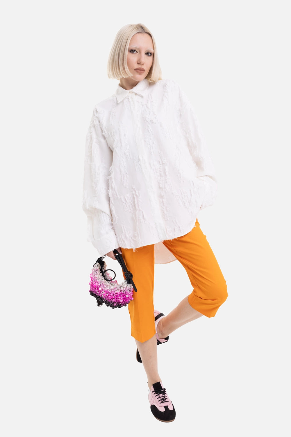 MSGM women's fil coupé shirt in White, on-model full-length view, frayed texture and long sleeves