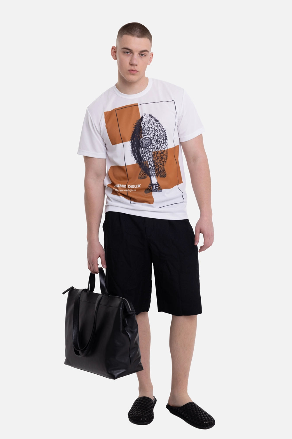 Comme des Garçons men's T-shirt in white, on-model full-length view, regular fit with fish graphic