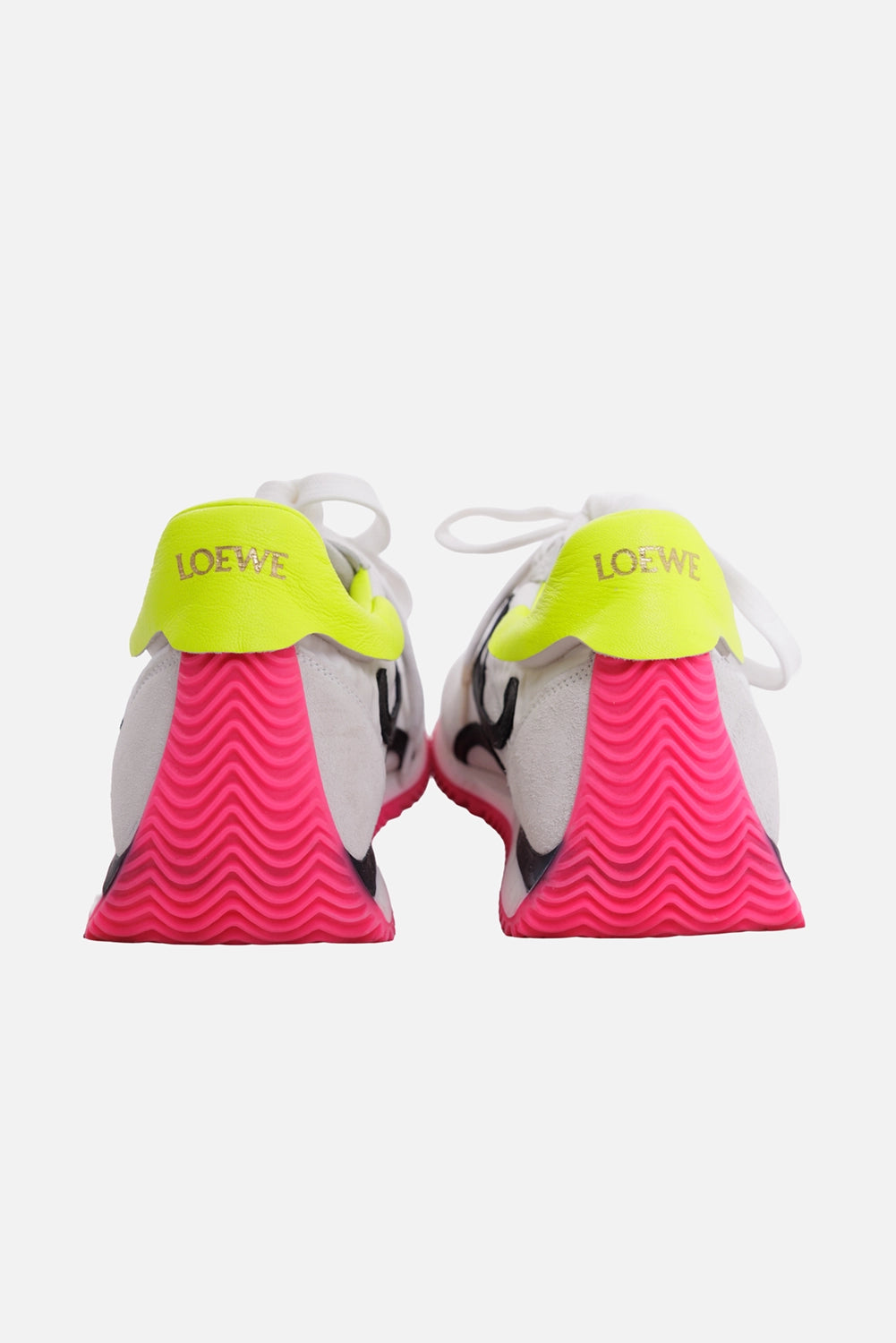 Loewe women's sneakers in white, back view, neon yellow heel tabs with logo and pink ridged heels