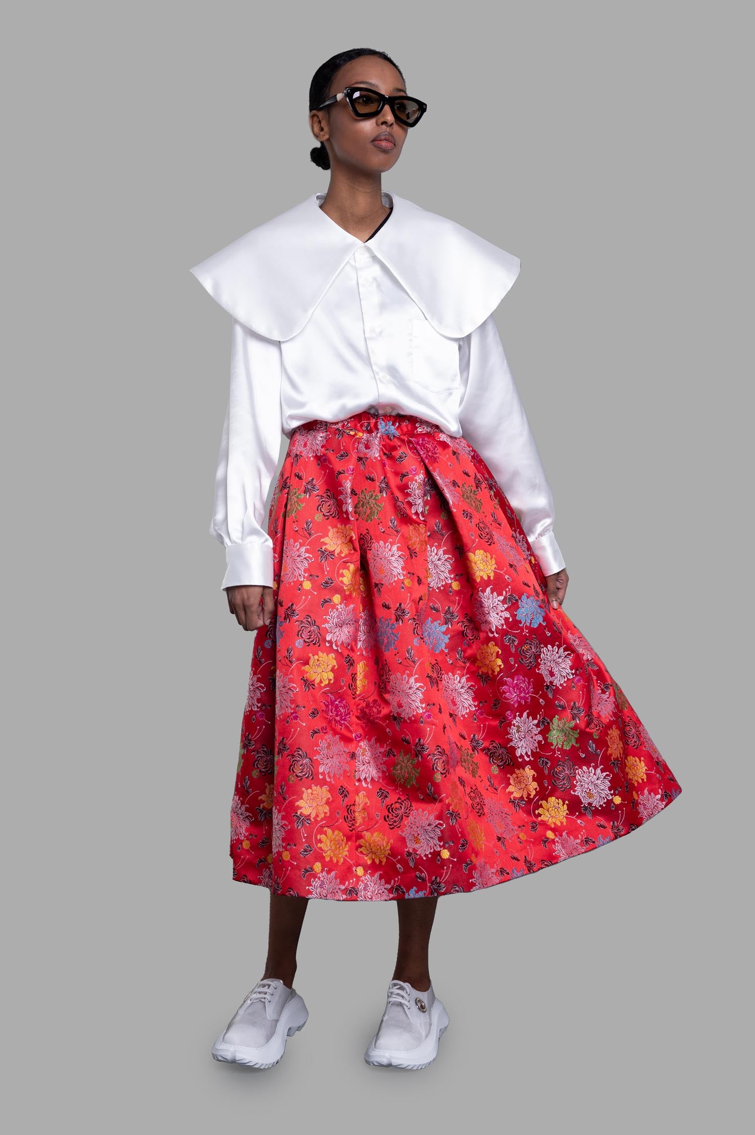 Comme des Garçons Floral-jacquard Midi Skirt, red, on-model front view, with drawstring waist and side pockets.
